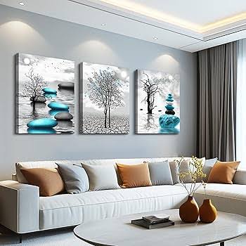 Blue stone canvas wall art displayed above a white living room sofa